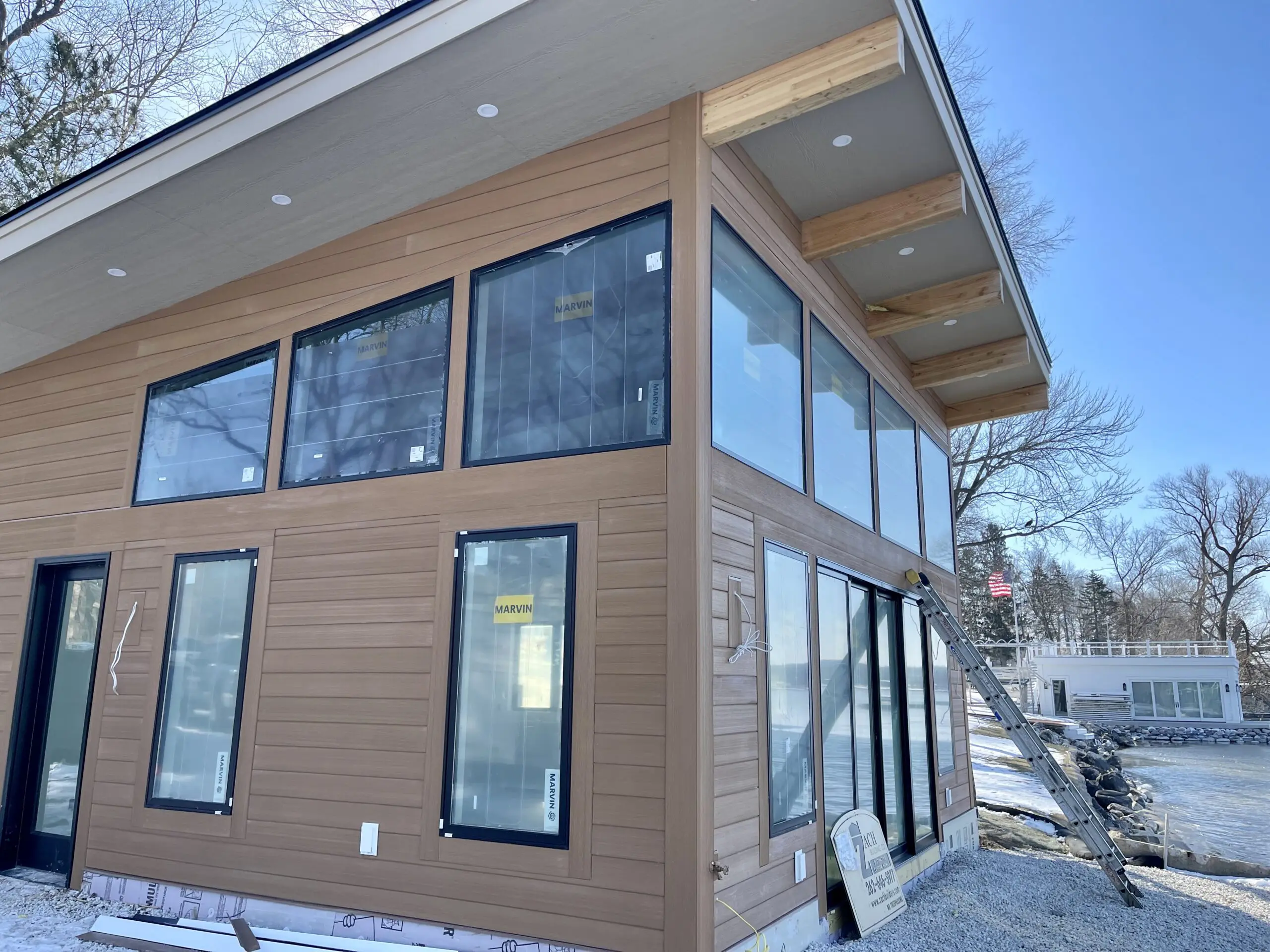 Completed siding on a boathouse by L.H. Krueger and Son