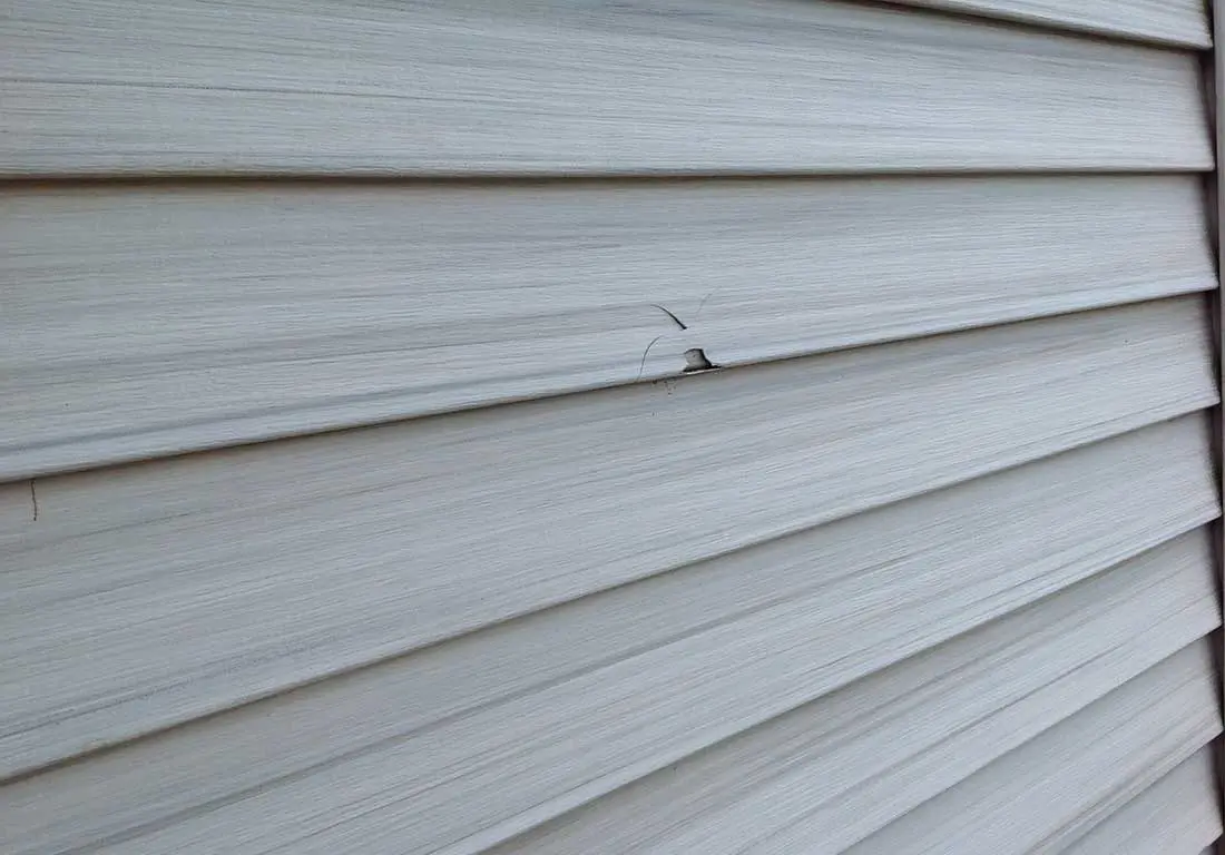 Hail damage on vinyl siding