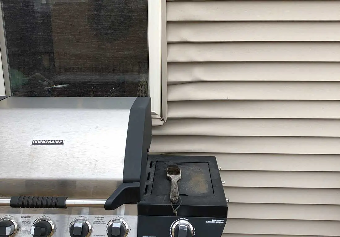Melted vinyl siding damage