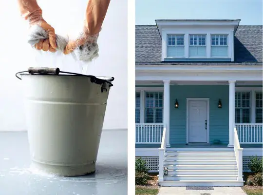 Clean and shiny James Hardie fibercement siding house against a light blue background