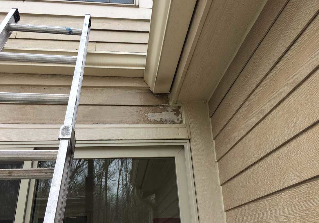 Gutter and siding damage from leaking