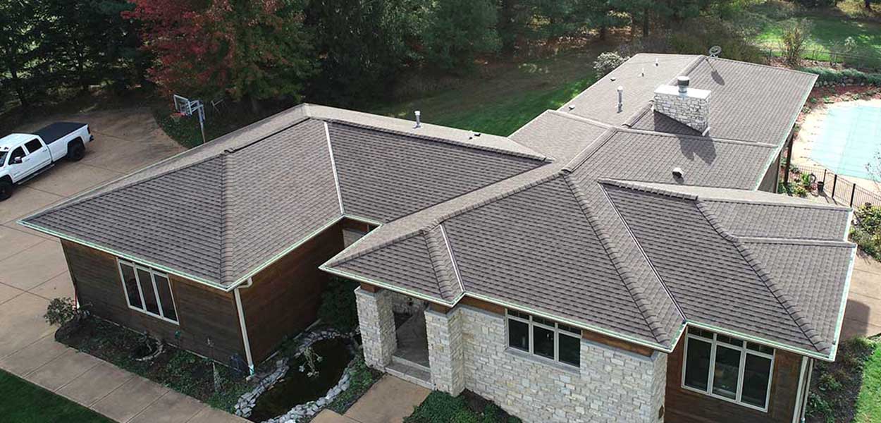 A home with asphalt roofing installed by L.H. Krueger