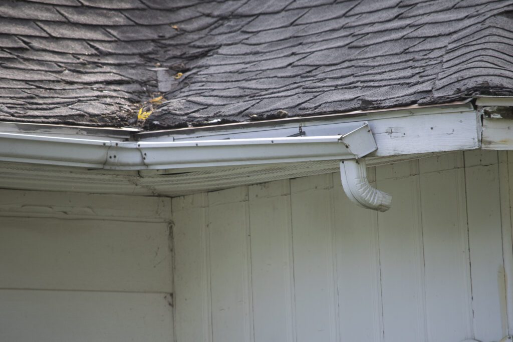 reattaching loose gutters