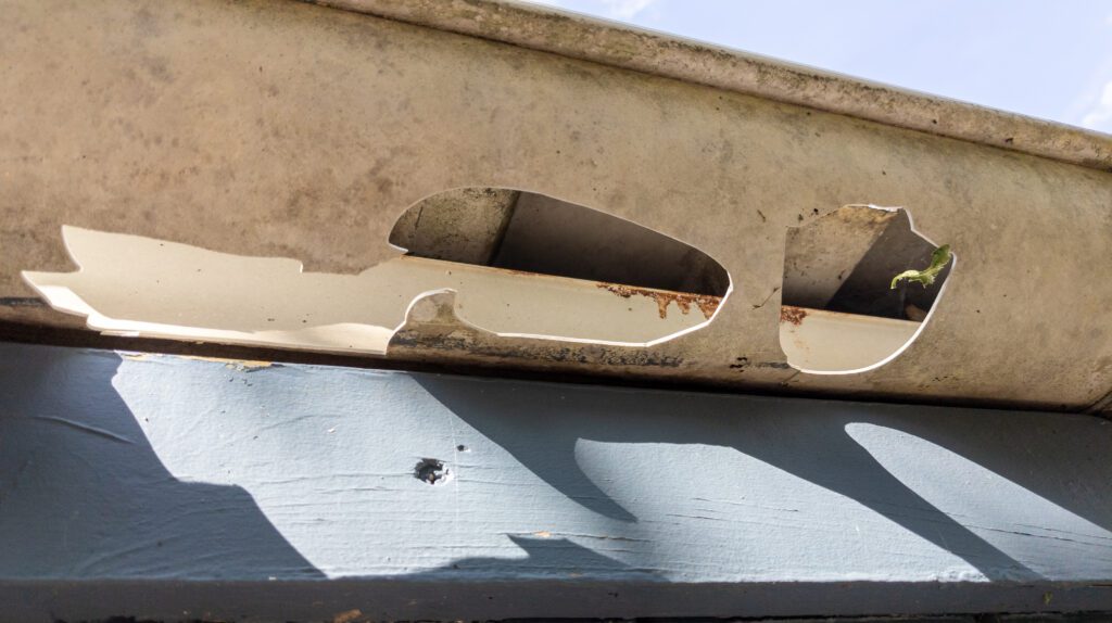repairing leaks and holes in gutters